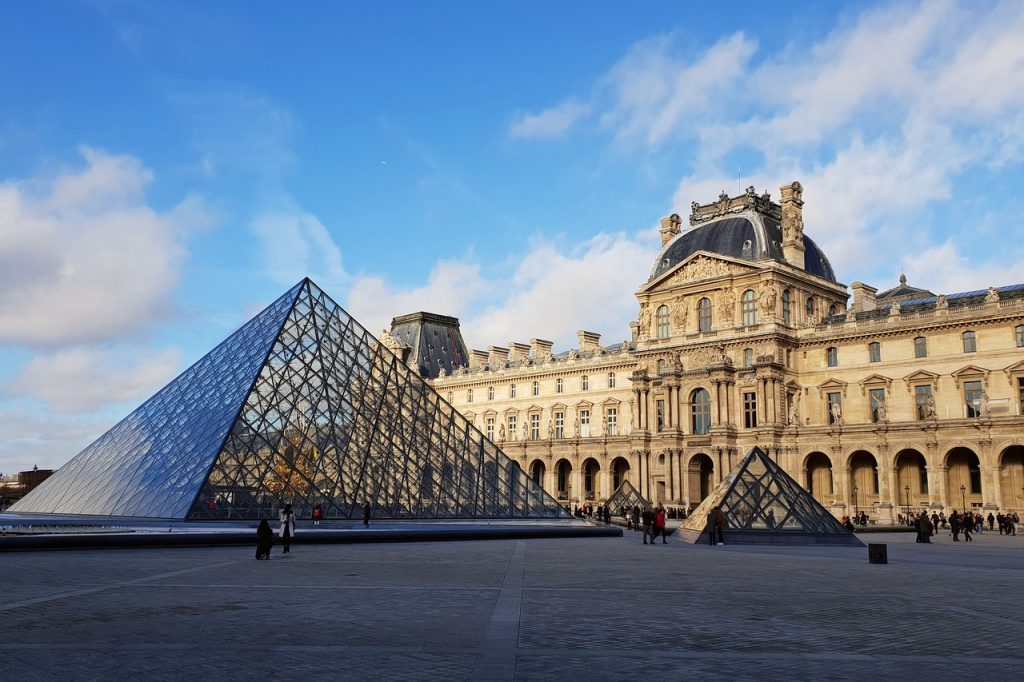 Begin your day with a visit to the Louvre. The famous Louvre Pyramid is an interesting subject for architectural photography.